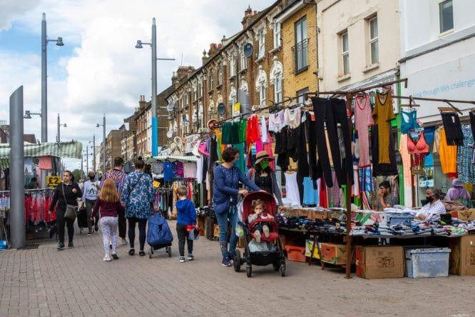 People wandering down Walthamstow Market, one of the best weekend markets in London