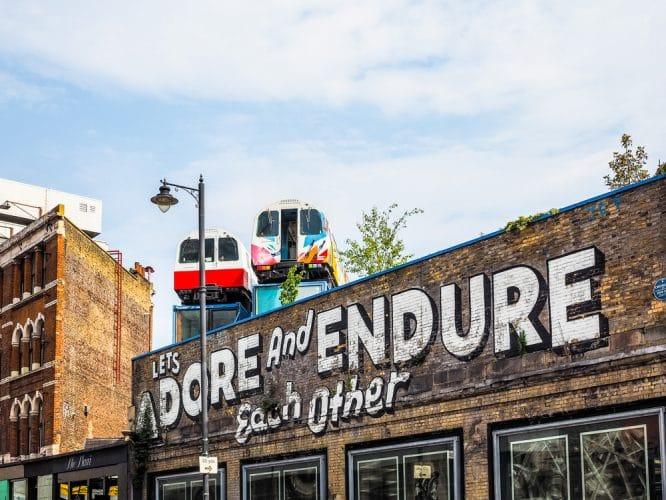 The famous tube trains above Village Underground in Shoreditch, East London