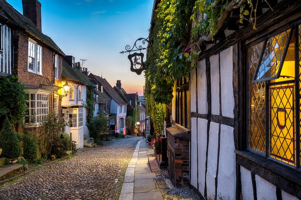 A charming cobbled street at dusk in Rye, Sussex, one of the best seaside towns near London