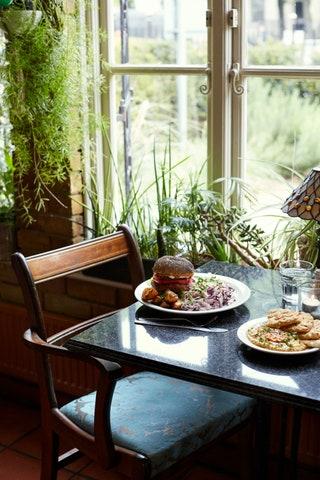 CAFE VAN GOGH STOCKWELL    Follow a quirky iron sign at the leafy end of Brixton Road to find this communityrun 100 per...